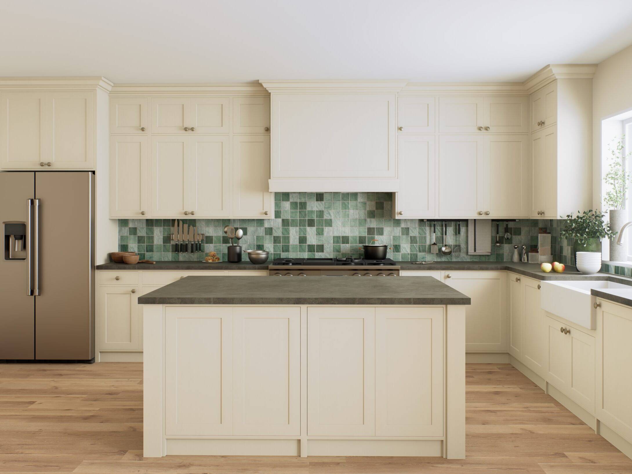 A modern kitchen with cream cabinets, a central island, a stainless steel refrigerator, green tiled backsplash, wooden floor, farmhouse sink, and large window letting in natural light.